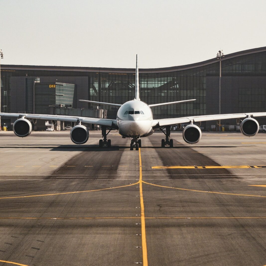 Passenger aircraft taxiing on the airport apron